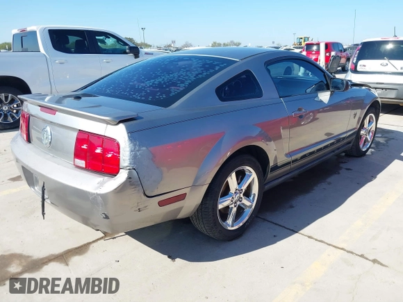 2009 Ford Mustang with VIN 1ZVHT80N595134732, listed as a IAAI auction lot 40931192 with 145,401 mi miles and . Bid and sale history available at carsss.com. Image 4.