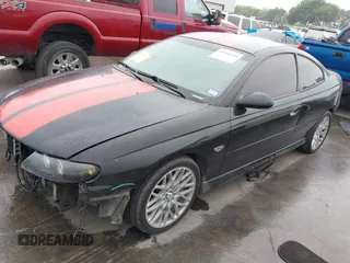 2004 Pontiac GTO z VIN 6G2VX12G84L183838, wystawiony jako IAAI lot #41946144 z przebiegiem 134 718 mil mil oraz . Historia ofert i sprzedaży dostępna na DreamBid. Obrazek 2.