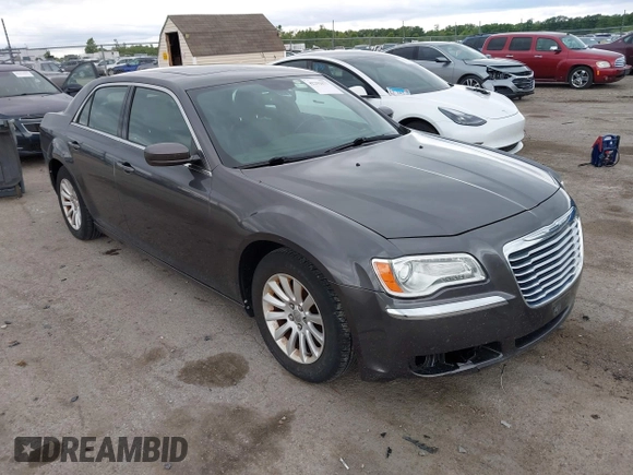 2013 Chrysler 300 with VIN 2C3CCAAG9DH707447, listed as a IAAI auction lot 42292077 with 171,329 mi miles and . Bid and sale history available at DreamBid. Image 1.