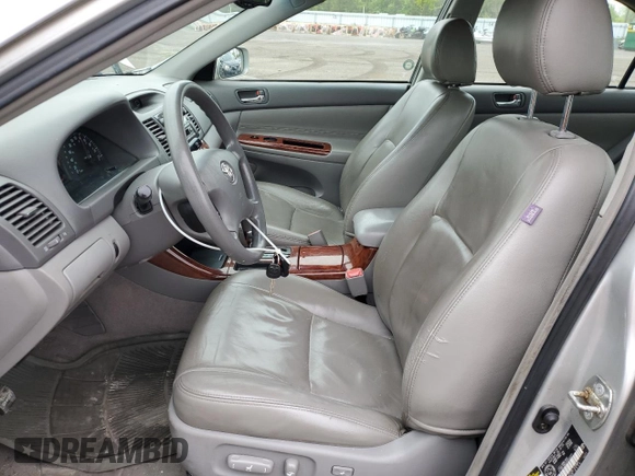 2004 Toyota Camry LE with VIN 4T1BE30K64U323377, listed as a Copart auction lot 58249465 with 274,902 mi miles and Salvage title. Bid and sale history available at DreamBid. Image 7.