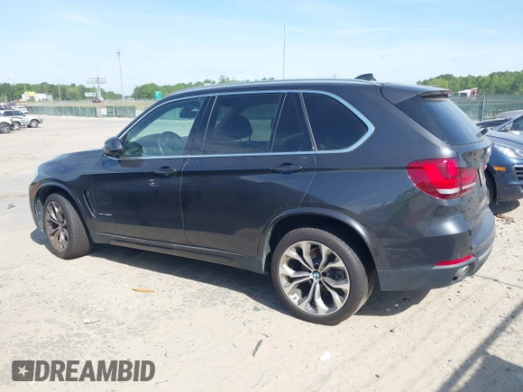2014 BMW X5 xDrive35d with VIN 5UXKS4C57E0J93982, listed as a IAAI auction lot 42085173 with 169,908 mi miles. Bid and sale history available at carsss.com. Image 15.