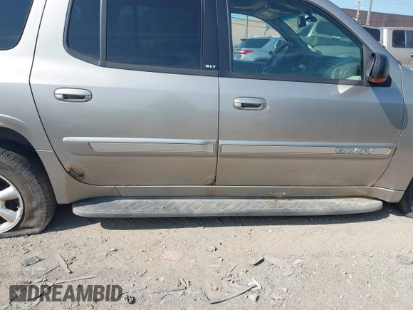 2003 GMC Envoy SLT with VIN 1GKES16S336101568, listed as a IAAI auction lot 40187998 with 185,402 mi miles. Bid and sale history available at carsss.com. Image 16.