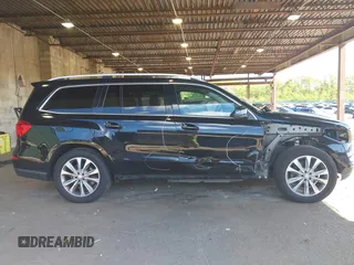 2014 Mercedes-Benz GL 450 z VIN 4JGDF7CE7EA395551, wystawiony jako IAAI lot #42247332 z przebiegiem 105 636 mil mil oraz . Historia ofert i sprzedaży dostępna na DreamBid. Obrazek 14.