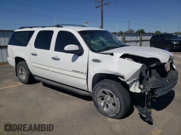 2007 GMC Yukon XL SLT z VIN 1GKFK16327J355384, wystawiony jako Copart lot #52161335 z przebiegiem 127 368 mil mil oraz Szkoda całkowita • Salvage title. Historia ofert i sprzedaży dostępna na DreamBid. Obrazek 4.