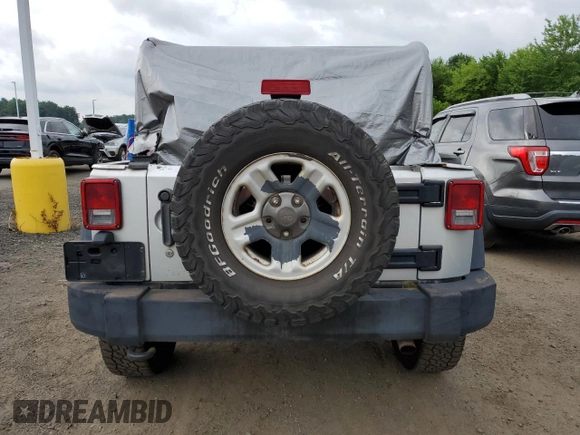 2012 Jeep Wrangler Sport с VIN 1C4AJWAG9CL157805, выставлен на аукционе Copart как лот 65205905 с пробегом 249 221 миль миль и Чистый • Clean title. История ставок и продаж доступна на DreamBid. Изображение 6.