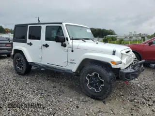2018 Jeep Wrangler JK Unlimited Sahara with VIN 1C4HJWEG7JL928008, listed as a Copart auction lot 73210964 with 132,068 mi miles and Salvage Title. Bid and sale history available at carsss.com. Image 4.