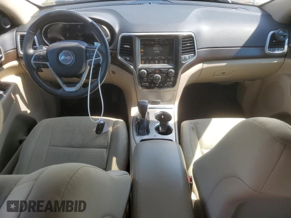 2016 Jeep Grand Cherokee Laredo with VIN 1C4RJEAG4GC500524, listed as a Copart auction lot 61613725 with 122,467 mi miles and Salvage title. Bid and sale history available at DreamBid. Image 8.