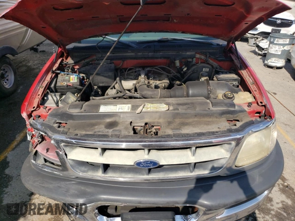 1998 Ford F-150 with VIN 1FTZF1821WKA63445, listed as a Copart auction lot 62563374 with 270,311 mi miles and Salvage title. Bid and sale history available at DreamBid. Image 11.
