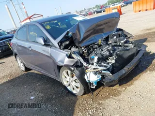 2014 Hyundai Accent GLS with VIN KMHCU4AE8EU737235, listed as a IAAI auction lot 42471397 with 111,985 mi miles and . Bid and sale history available at DreamBid. Image 1.