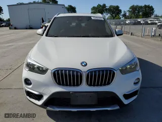 2019 BMW X1 xDrive28i with VIN WBXHT3C53K5L35670, listed as a Copart auction lot 53493245 with 14,201 mi miles and Salvage Title. Bid and sale history available at carsss.com. Image 5.