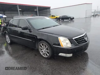 2007 Cadillac DTS Performance z VIN 1G6KD57937U213867, wystawiony jako IAAI lot #42208554 z przebiegiem 232 372 mil mil oraz . Historia ofert i sprzedaży dostępna na DreamBid. Obrazek 1.