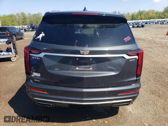 2021 Cadillac XT6 Premium Luxury with VIN 1GYKPDRS5MZ209942, listed as a Copart auction lot 52539124 with 0 mi miles and Salvage Title. Bid and sale history available at carsss.com. Image 6.