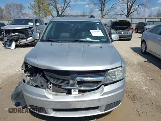 2009 Dodge Journey SXT with VIN 3D4GG57V19T138643, listed as a IAAI auction lot 41901454 with 150,576 mi miles. Bid and sale history available at carsss.com. Image 12.
