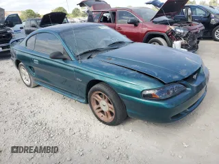 1998 Ford Mustang GT z VIN 1FAFP42X0WF255816, wystawiony jako Copart lot #55011425 z przebiegiem 144 397 mil mil oraz Czysty tytuł • Clean title. Historia ofert i sprzedaży dostępna na DreamBid. Obrazek 4.