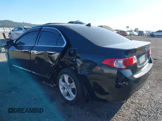 2009 Acura TSX with VIN JH4CU26659C021235, listed as a IAAI auction lot 42014591 with 201,036 mi miles. Bid and sale history available at carsss.com. Image 3.