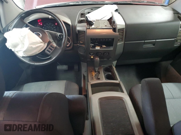 2004 Nissan Titan SE z VIN 1N6AA06A84N590696, wystawiony jako Copart lot #55947145 z przebiegiem 244 851 mil mil oraz Szkoda całkowita • Salvage title. Historia ofert i sprzedaży dostępna na DreamBid. Obrazek 8.
