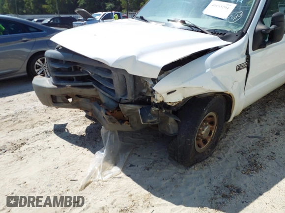 1999 Ford Super Duty F-250 XL with VIN 1FTNF20L3XEC76809, listed as a IAAI auction lot 40153294 with 457,050 mi miles. Bid and sale history available at carsss.com. Image 6.