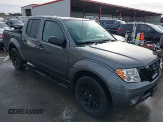2021 Nissan Frontier SV z VIN 1N6ED0EA6MN722476, wystawiony jako IAAI lot #41284313 z przebiegiem 22 476 mil mil oraz . Historia ofert i sprzedaży dostępna na DreamBid. Obrazek 1.