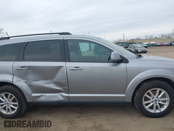 2019 Dodge Journey SE with VIN 3C4PDCBBXKT810874, listed as a IAAI auction lot 41960889 with 170,441 mi miles and . Bid and sale history available at DreamBid. Image 13.