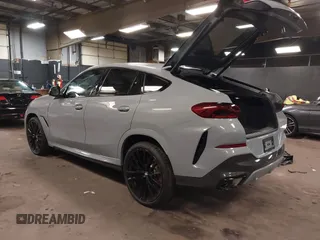 2025 BMW X6 xDrive40i with VIN 5UX33EX04S9Z44291, listed as a IAAI auction lot 41827897 with 1,053 mi miles. Bid and sale history available at carsss.com. Image 3.