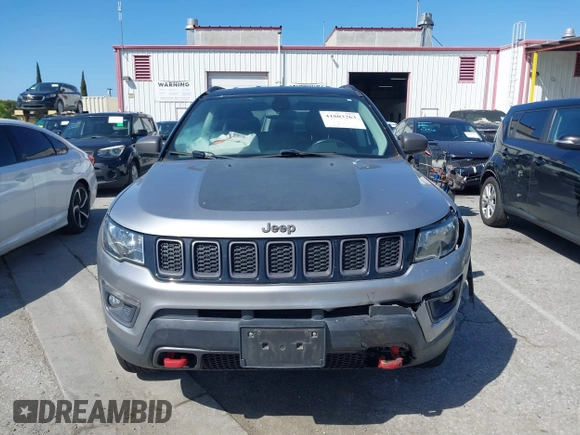 2019 Jeep Compass Trailhawk with VIN 3C4NJDDBXKT627350, listed as a IAAI auction lot 41803263 with 63,768 mi miles and . Bid and sale history available at DreamBid. Image 12.