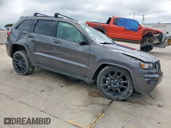 2018 Jeep Grand Cherokee Altitude with VIN 1C4RJFAG0JC250082, listed as a Copart auction lot 55940135 with 79,523 mi miles and Salvage title. Bid and sale history available at DreamBid. Image 4.