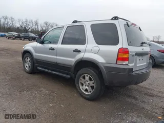 2005 Ford Escape XLT with VIN 1FMYU93125KD27166, listed as a IAAI auction lot 41892715 with 59,067 mi miles. Bid and sale history available at carsss.com. Image 3.