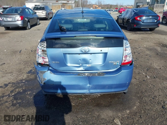 2006 Toyota Prius with VIN JTDKB20U167073069, listed as a IAAI auction lot 41886556 with 122,945 mi miles. Bid and sale history available at carsss.com. Image 16.