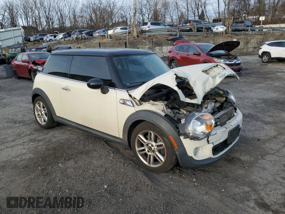 2011 MINI Hardtop S with VIN WMWSV3C54BTY14010, listed as a Copart auction lot 50754225 with 69,852 mi miles and Salvage Title. Bid and sale history available at DreamBid. Image 4.