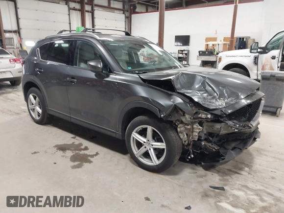 2020 Mazda CX-5 Grand Touring with VIN JM3KFBDM3L0739763, listed as a IAAI auction lot 41751250 with 88,063 mi miles and . Bid and sale history available at carsss.com. Image 1.