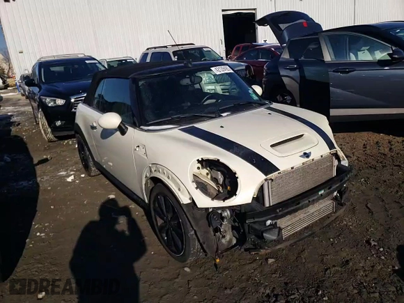 2014 MINI Convertible S z VIN WMWZP3C58ET707569, wystawiony jako Copart lot #42129485 z przebiegiem 62 343 mil mil oraz Szkoda całkowita • Salvage title. Historia ofert i sprzedaży dostępna na DreamBid. Obrazek 14.