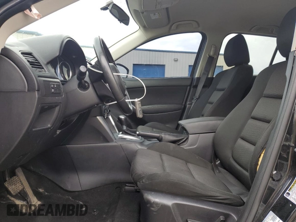 2014 Mazda CX-5 Touring with VIN JM3KE2CY8E0424757, listed as a Copart auction lot 54703195 with 111,401 mi miles and Salvage Title. Bid and sale history available at DreamBid. Image 7.