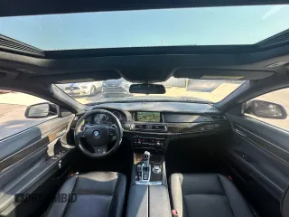 2013 BMW 7 Series 740i with VIN WBAYA6C55DC995225, listed as a Copart auction lot 76207974 with 126,648 mi miles and Clean Title. Bid and sale history available at carsss.com. Image 9.