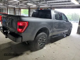 2021 Ford F-150 XL with VIN 1FTFW1E82MFA21318, listed as a Copart auction lot 54409795 with 74,977 mi miles and Salvage Title. Bid and sale history available at carsss.com. Image 3.