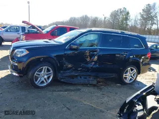 2015 Mercedes-Benz GL-Class GL 550 with VIN 4JGDF7DE3FA505480, listed as a IAAI auction lot 41269725 with 87,284 mi miles. Bid and sale history available at carsss.com. Image 14.