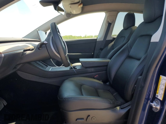 2022 Tesla Model Y Long Range z VIN 7SAYGDEEXNF444122, wystawiony jako Copart lot #54344735 z przebiegiem 33 230 mil mil oraz Szkody całkowita. Historia ofert i sprzedaży dostępna na DreamBid. Obrazek 7.
