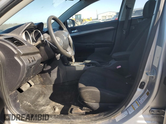2015 Mitsubishi Lancer ES z VIN JA32U2FU4FU022022, wystawiony jako Copart lot #46281395 z przebiegiem 142 071 mil mil oraz Szkoda całkowita • Salvage title. Historia ofert i sprzedaży dostępna na DreamBid. Obrazek 7.
