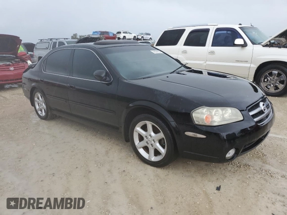 2002 Nissan Maxima GXE z VIN JN1DA31D42T427865, wystawiony jako Copart lot #74374134 z przebiegiem Nie podano mil oraz Szkoda całkowita • Salvage title. Historia ofert i sprzedaży dostępna na DreamBid. Obrazek 4.