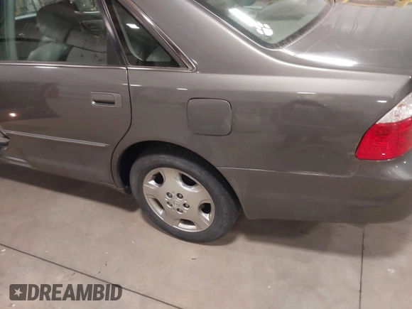 2004 Toyota Avalon XL z VIN 4T1BF28B64U389214, wystawiony jako IAAI lot #42131695 z przebiegiem 187 352 mil mil oraz . Historia ofert i sprzedaży dostępna na DreamBid. Obrazek 6.