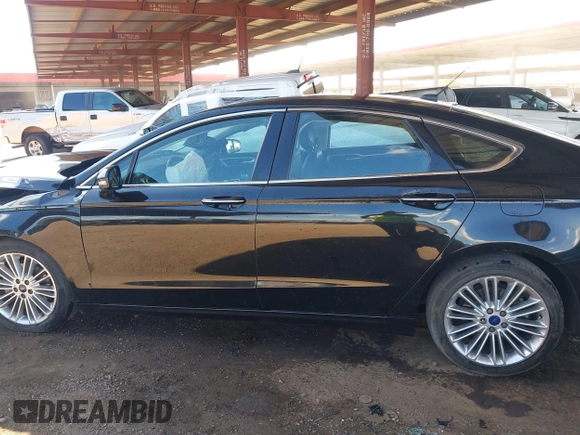 2014 Ford Fusion SE Hybrid with VIN 3FA6P0LUXER291754, listed as a IAAI auction lot 42415936 with 154,474 mi miles and . Bid and sale history available at DreamBid. Image 14.