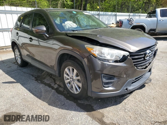 2016 Mazda CX-5 Sport with VIN JM3KE4BY4G0805179, listed as a Copart auction lot 52412745 with 85,928 mi miles and Salvage Title. Bid and sale history available at carsss.com. Image 4.
