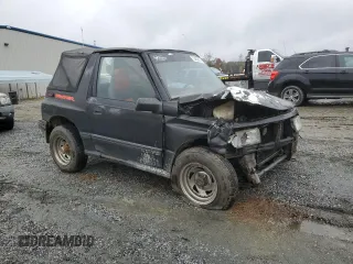 1992 Geo Tracker z VIN 2CNBJ18U8N6938728, wystawiony jako Copart lot #79459914 z przebiegiem 17 751 mil mil oraz Szkody całkowita. Historia ofert i sprzedaży dostępna na DreamBid. Obrazek 4.