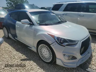 2016 Hyundai Veloster Turbo z VIN KMHTC6AEXGU261247, wystawiony jako Copart lot #52240215 z przebiegiem 137 238 mil mil oraz Czysty tytuł • Clean title. Historia ofert i sprzedaży dostępna na DreamBid. Obrazek 4.