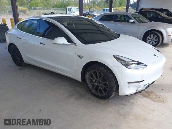 2018 Tesla Model 3 Long Range Battery z VIN 5YJ3E1EA1JF053895, wystawiony jako IAAI lot #42182178 z przebiegiem 75 356 mil mil oraz . Historia ofert i sprzedaży dostępna na DreamBid. Obrazek 1.