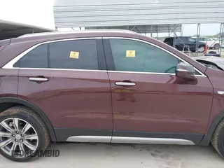 2022 Cadillac XT4 FWD Premium Luxury with VIN 1GYFZCR4XNF116845, listed as a IAAI auction lot 42128210 with 43,423 mi miles and . Bid and sale history available at DreamBid. Image 12.