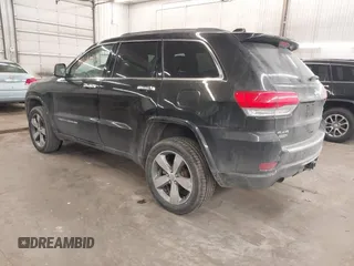 2014 Jeep Grand Cherokee Overland with VIN 1C4RJFCG8EC177899, listed as a IAAI auction lot 41695290 with 200,867 mi miles and . Bid and sale history available at DreamBid. Image 3.