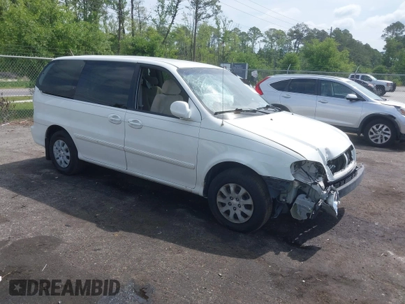 2005 Kia Sedona LX with VIN KNDUP132056702484, listed as a IAAI auction lot 42099572 with 195,528 mi miles and . Bid and sale history available at DreamBid. Image 1.