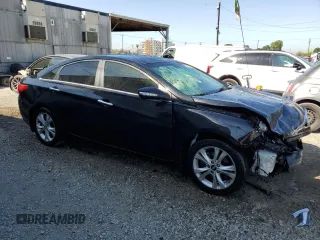 2013 Hyundai Sonata SE z VIN 5NPEC4AC4DH726725, wystawiony jako Copart lot #51821295 z przebiegiem 94 092 mil mil oraz Szkoda całkowita • Salvage title. Historia ofert i sprzedaży dostępna na DreamBid. Obrazek 4.