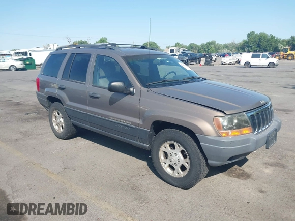 2001 Jeep Grand Cherokee Laredo with VIN 1J4GW48S81C694537, listed as a IAAI auction lot 42447828 with 162,981 mi miles and . Bid and sale history available at DreamBid. Image 1.