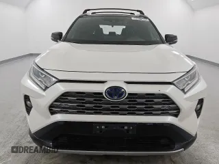 2021 Toyota RAV4 Hybrid XSE with VIN 4T3E6RFV8MU060122, listed as a Copart auction lot 62019045 with 60,971 mi miles and Salvage title. Bid and sale history available at DreamBid. Image 5.